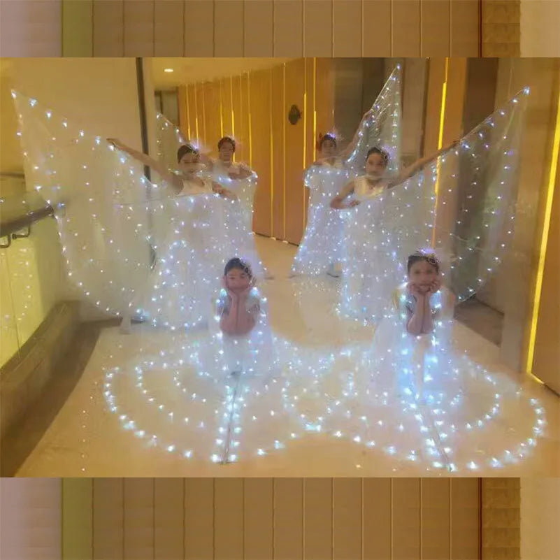 dancers  
Fluorescent butterfly dance LED wings Children's Wear An adult dance LED Cloak LED luminous dance skirt Belly Dance Costume