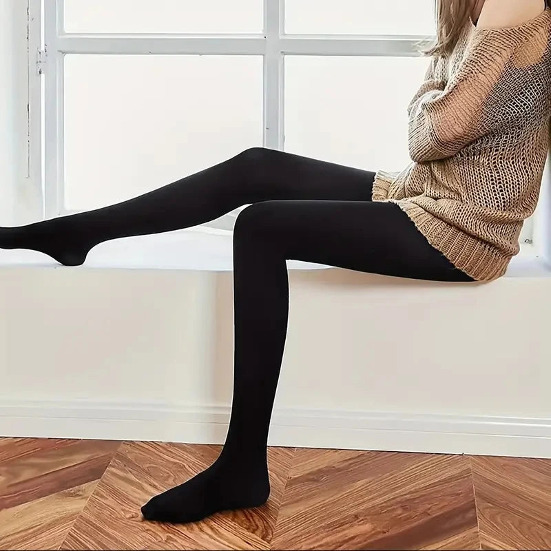 Tights 
A pair of slim-fit tights, opaque high-waisted thermal stretch leggings, women's stockings and stockings