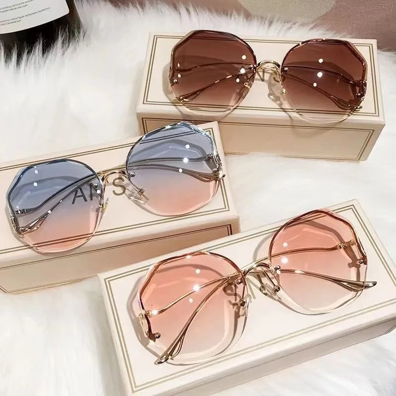 Women's Sunglasses Trendy fashionable polygonal frameless cut edge sunglasses women's metal curved legs retro street photo sunglasses