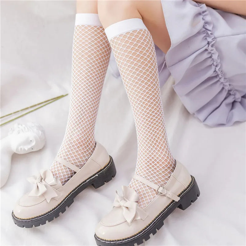 Stockings 
Mesh Fishnet Stockings Women JK Lolita Sweet Girls Black White Long Socks Japanese Style Hollow Out Mesh Knee Socks Stockings