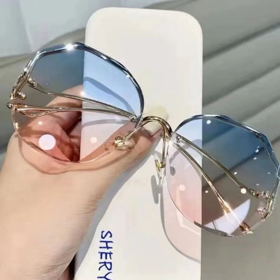 Women's Sunglasses Trendy fashionable polygonal frameless cut edge sunglasses women's metal curved legs retro street photo sunglasses